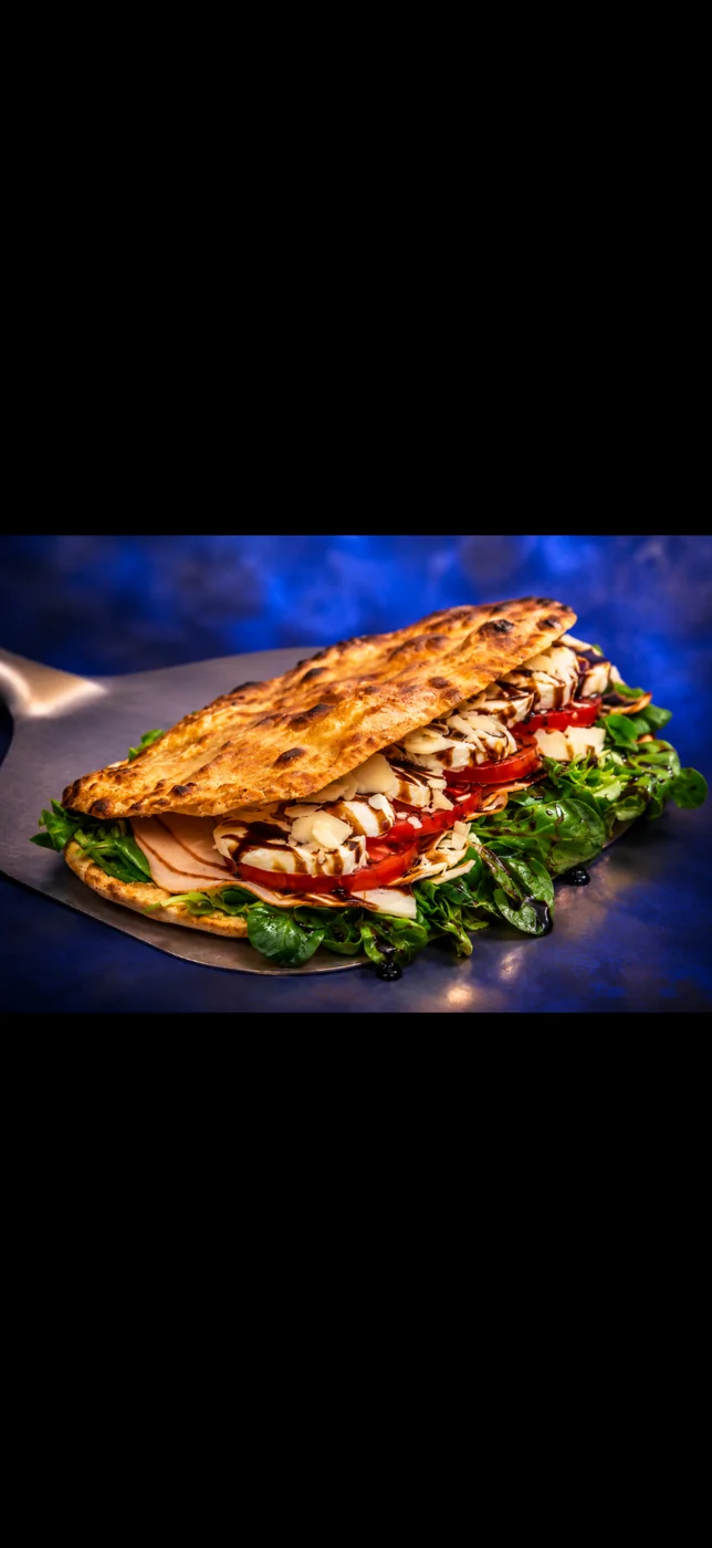 Panuozzo TAKE OFF, roquette, bœuf séché et mozzarella